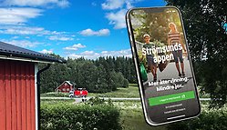 Sopbil på landsbygd+mobilapp.